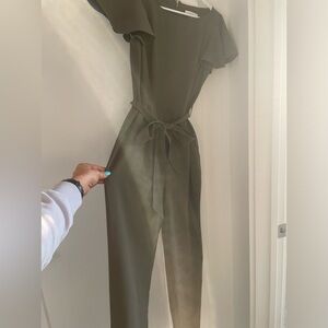 Army green Calvin Klein jumpsuit.